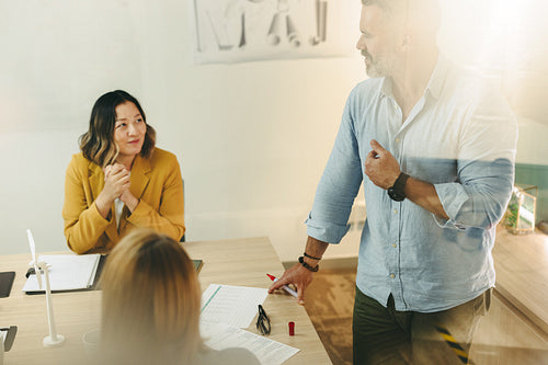 Mechanical engineer sharing his ideas during a meeting