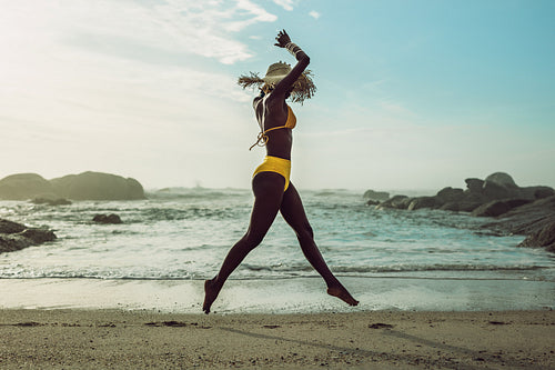 Woman enjoying herself at the beach