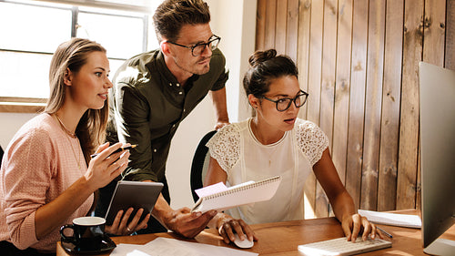 Business people working together on project at startup office