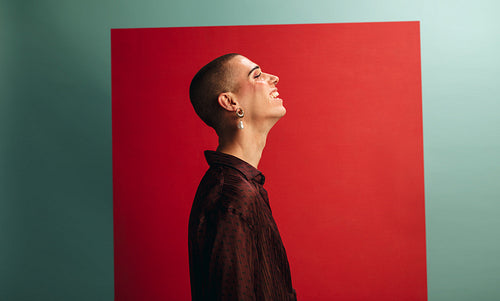 Transgender male looking happy