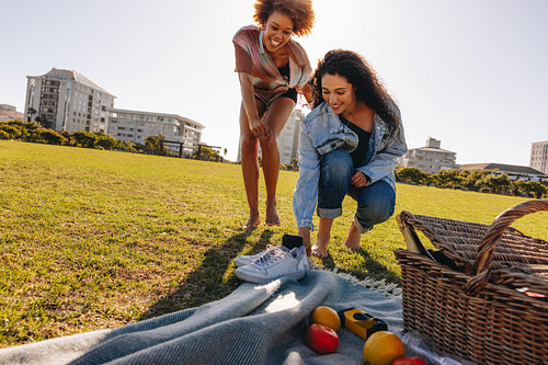 Friends recording a vlog while dancing for social media on a sunny day