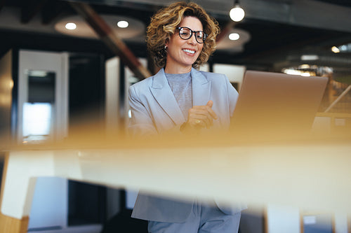Caucasian business woman having a video call in a coworking office