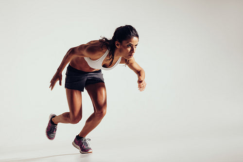 Energetic young woman running