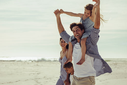 Family having a great time on the beach