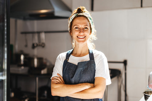 Portrait of a successful cafe owner smiling happily