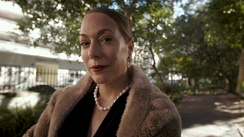 Good looking senior woman smiling at camera