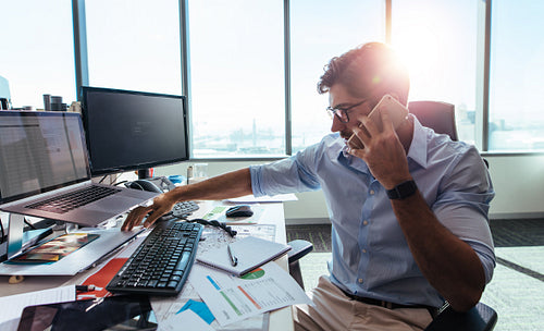 Young entrepreneur at work in his office.
