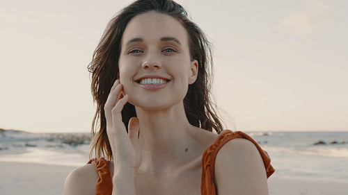 Pretty woman enjoying at the beach