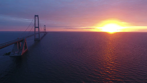 Storebaelt bridge over sea at sunset