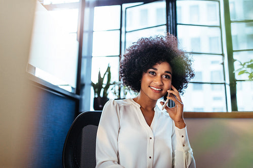 Female executive making a phone call
