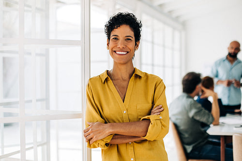 Portrait of a black business woman standing in an office