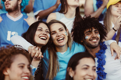 Argentinian supporters at stadium watching match
