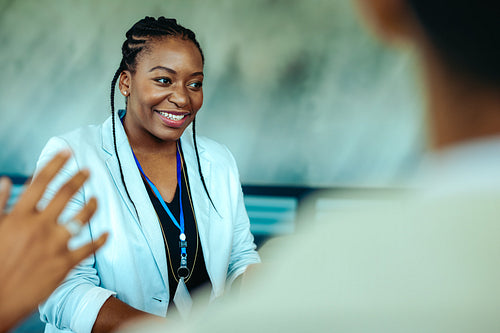 Confident professional woman engaged in a business meeting