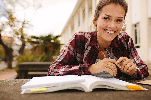 Girl student studying at university campus