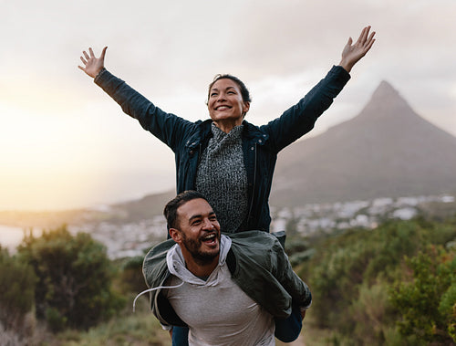 Young couple enjoying themselves in countryside