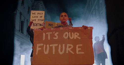 Activists with banners defending their rights