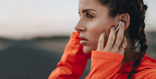Fitness woman taking break after morning run