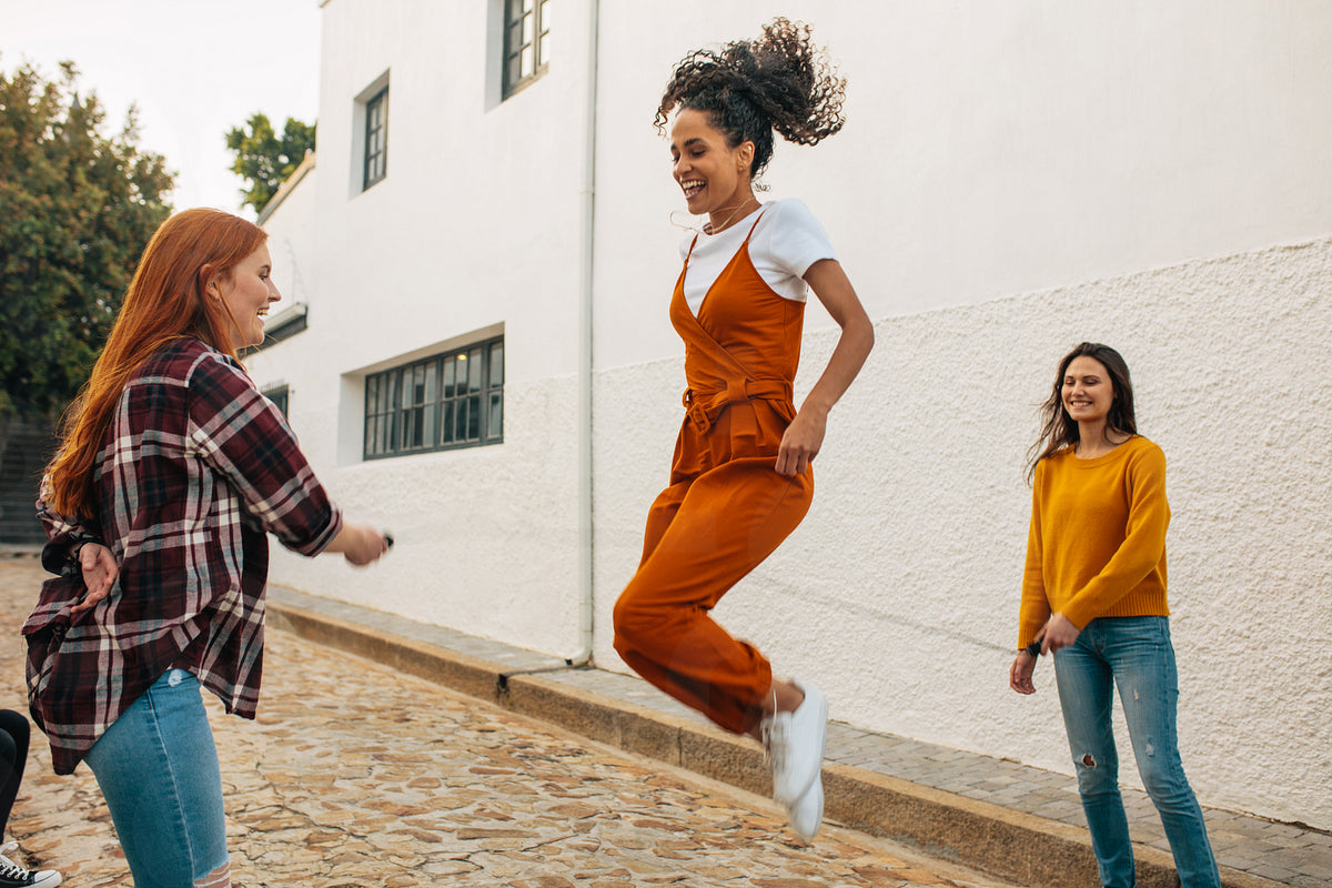 Friends playing jumping rope game – Jacob Lund Photography Store ...