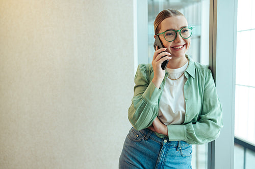 Businesswoman smiling during a phone call