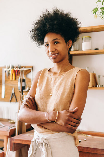 Thoughtful jewelry store owner