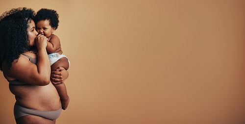 Mother and child on brown background