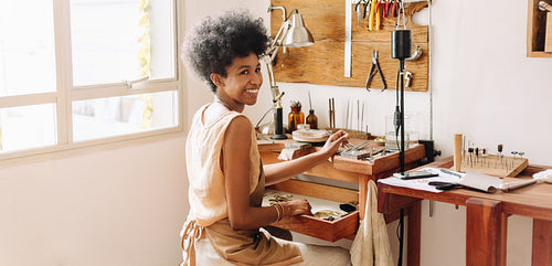 Female worker in jewelry workshop