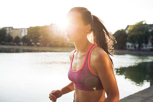 Determined young woman out for a run