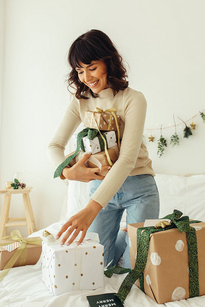 Woman collecting her christmas presents