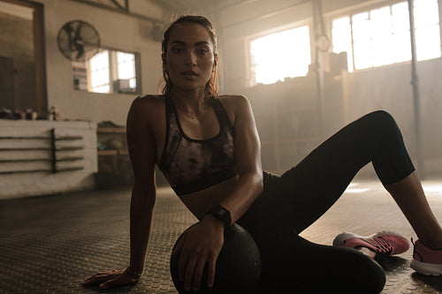 Female taking a break from workout