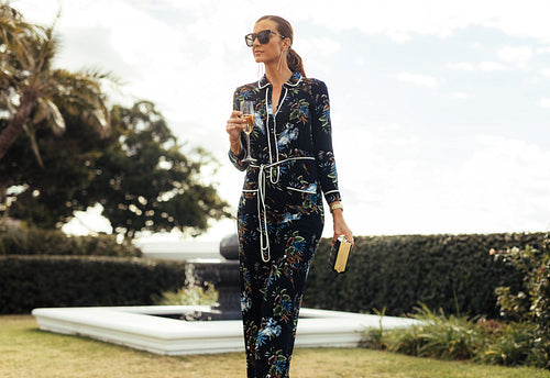 Gorgeous woman walking in lawn