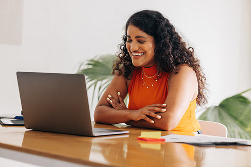 Young businesswoman having an online meting in a boardroom