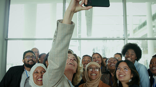 Happy diverse professionals enjoying a moment together during a corporate networking event