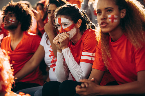 England football team supporters watching the match closely