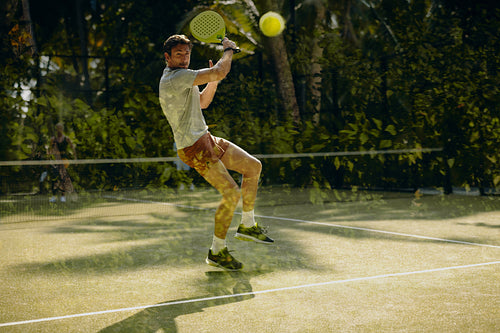 Padel player in action during vacation