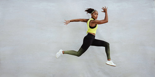 Fitness woman jumping