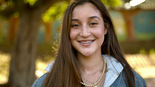 Beautiful young woman with braces