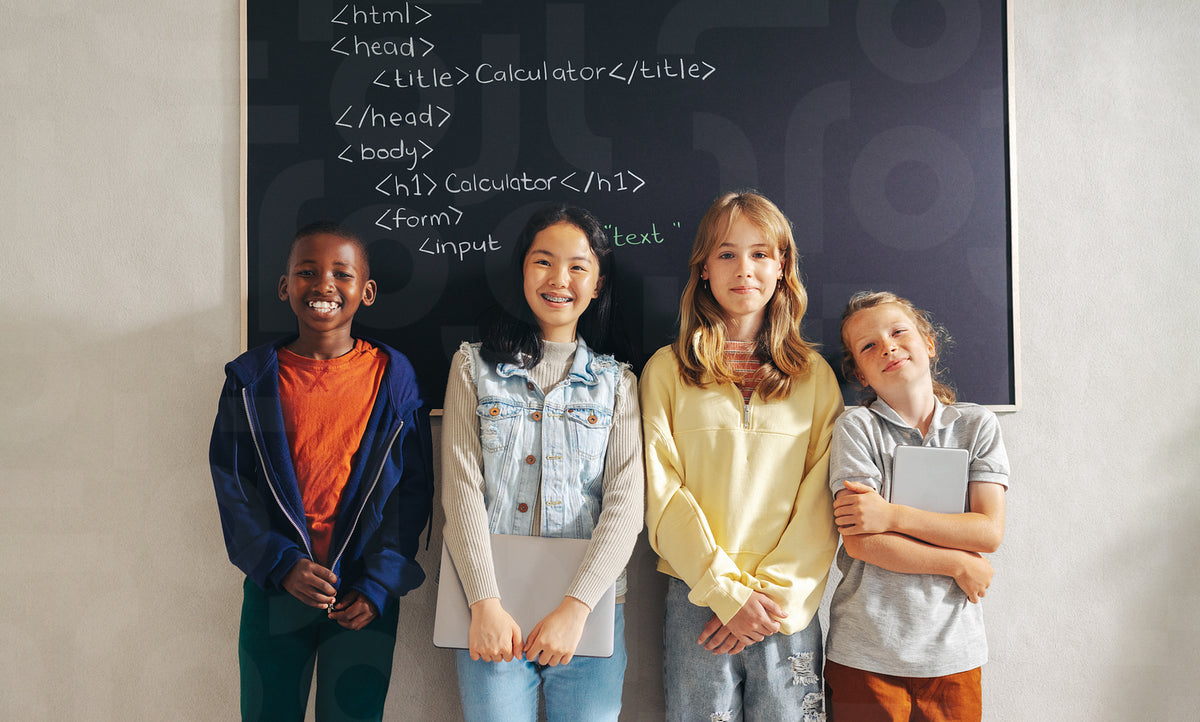 Innovative minds: group of kids standing in a computer coding class ...