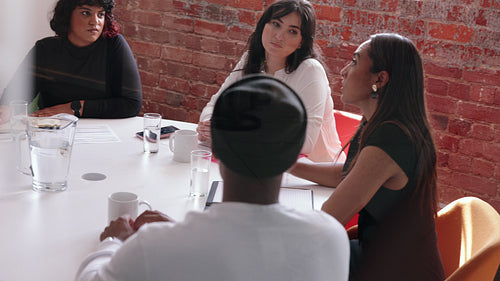 Meeting of creative minds: Group of diverse business professionals at work