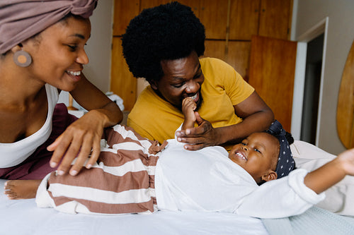 Happy family playing together indoors