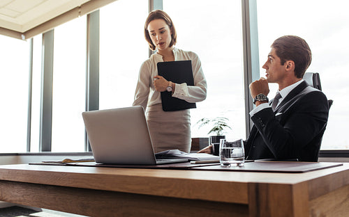 Two business professional working together in office