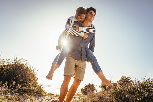 Couple on a holiday having fun on the beach