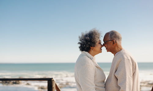 Mature couple being romantic at the beach