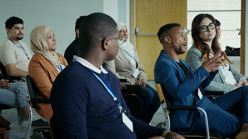 Attentive audience participating in a professional development event