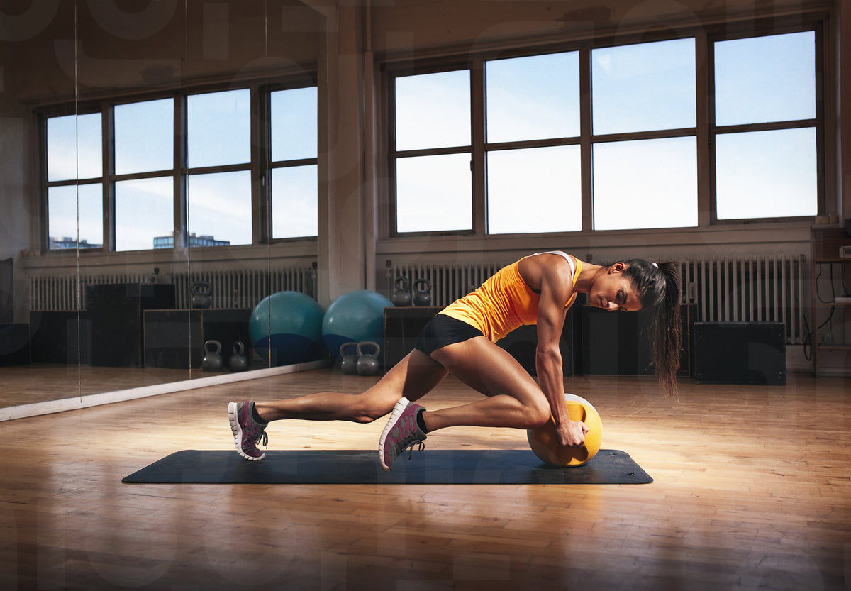 Woman Training Core Muscular woman doing intense core workout – Jacob Lund Photography ...