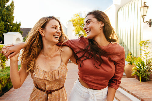 Two young women having fun together outdoors