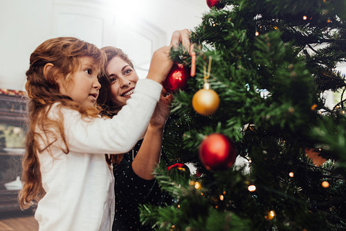 Mother and daughter celebrating Christmas.