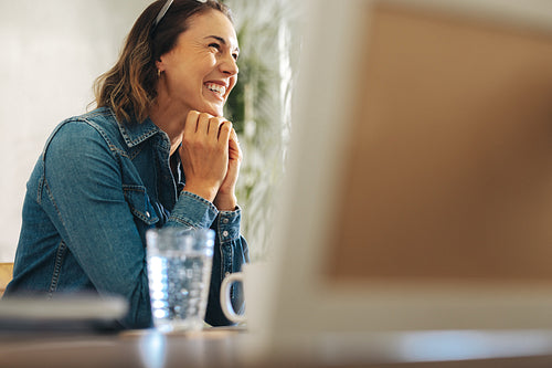 Productive businesswoman participating in an online meeting