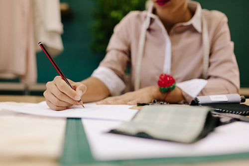 Female making new dress design