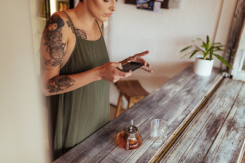 Woman taking photos for her blog