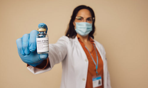 Doctor presenting new coronavirus vaccine